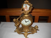 antique new haven statue clock with cupid and bird on it runs